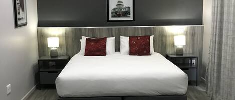 Premium bedding, down duvets, pillow-top beds, in-room safe