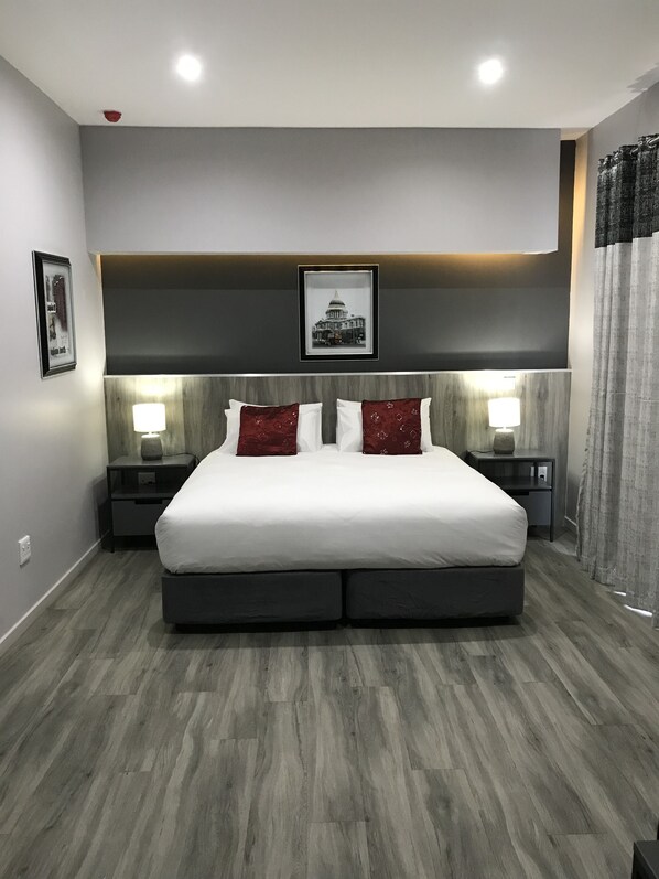 Premium bedding, down duvets, pillow-top beds, in-room safe