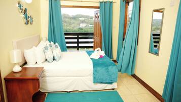 Premier Apartment, 1 Bedroom, Ocean View | 1 bedroom, free minibar, individually decorated, individually furnished