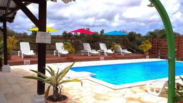 Outdoor pool, pool umbrellas, sun loungers