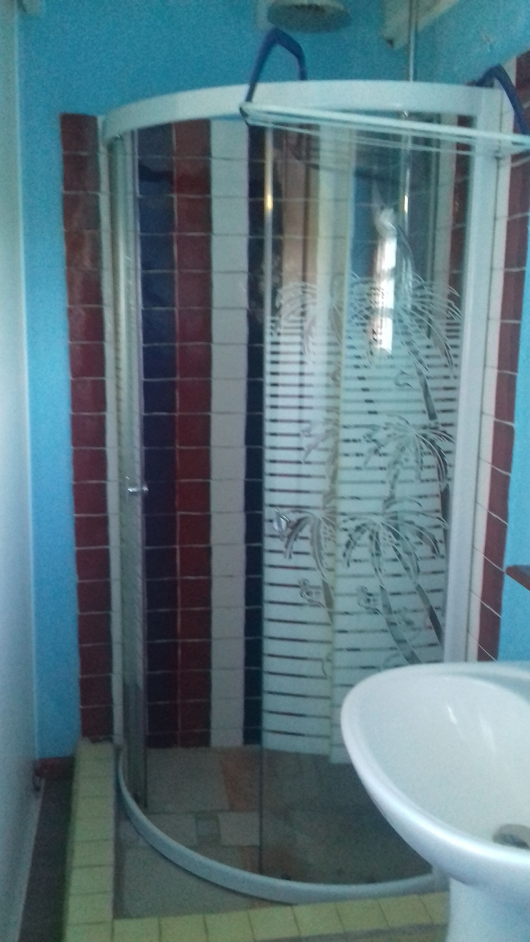 Economy Double Room - air-conditioned room | Bathroom | Shower, rainfall showerhead, towels, soap