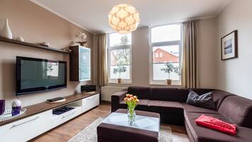 Apartment, 2 Bedrooms | Living area | Flat-screen TV, fireplace, DVD player