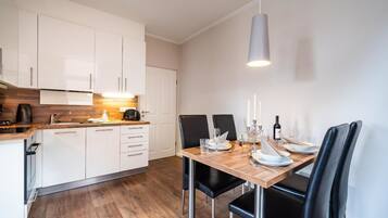 Apartment, 2 Bedrooms | Private kitchen | Full-sized fridge, microwave, oven, stovetop