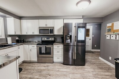 Spacious & Updated! Marquette Township Home - HotTub - Backyard - Garage