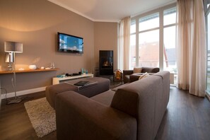 Apartment, 1 Schlafzimmer, Balkon | Wohnbereich | Flachbildfernseher, DVD-Player
