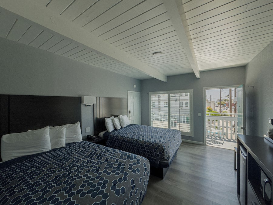 Quarto, 2 camas Queen | Wi-Fi de cortesia, roupa de cama