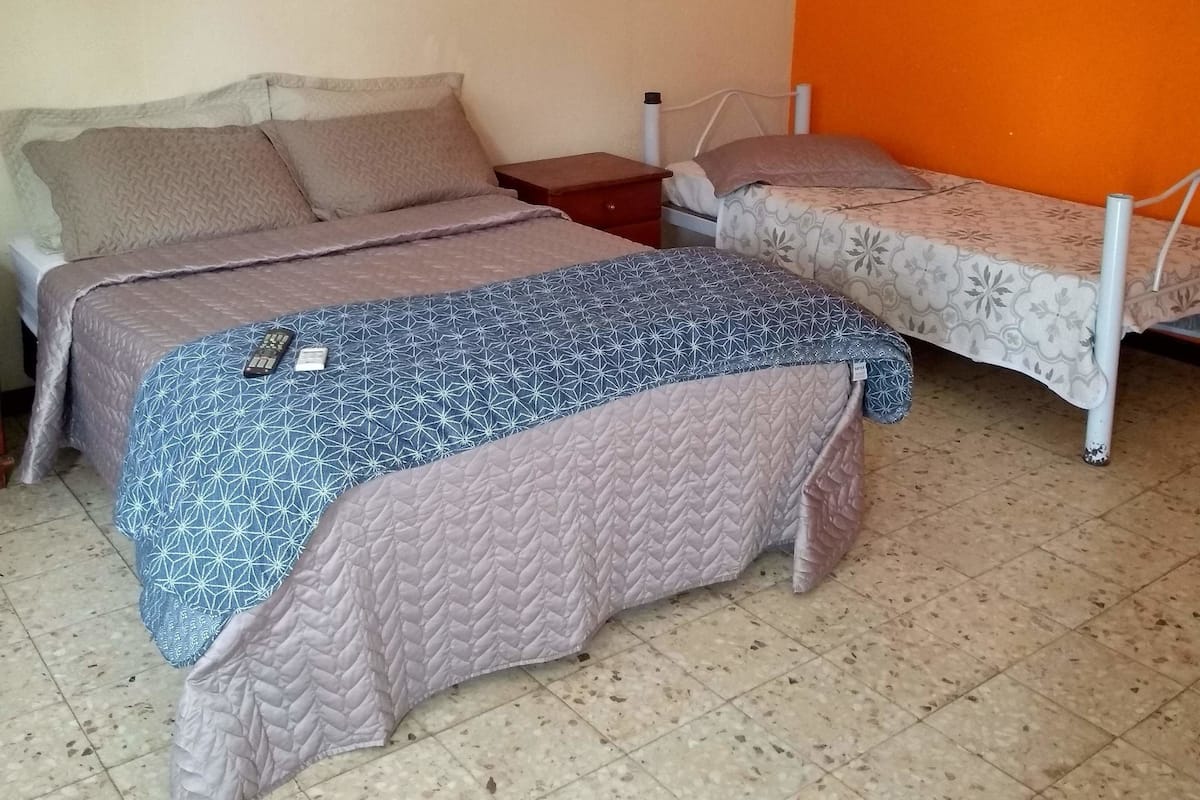 Triple Room, Multiple Beds | Minibar, blackout curtains, iron/ironing board, free WiFi