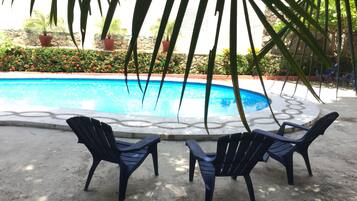 Outdoor pool, open 8:00 AM to 8:00 PM, free pool cabanas, pool umbrellas