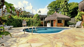 Outdoor pool, open 8:00 AM to 10:00 PM, sun loungers