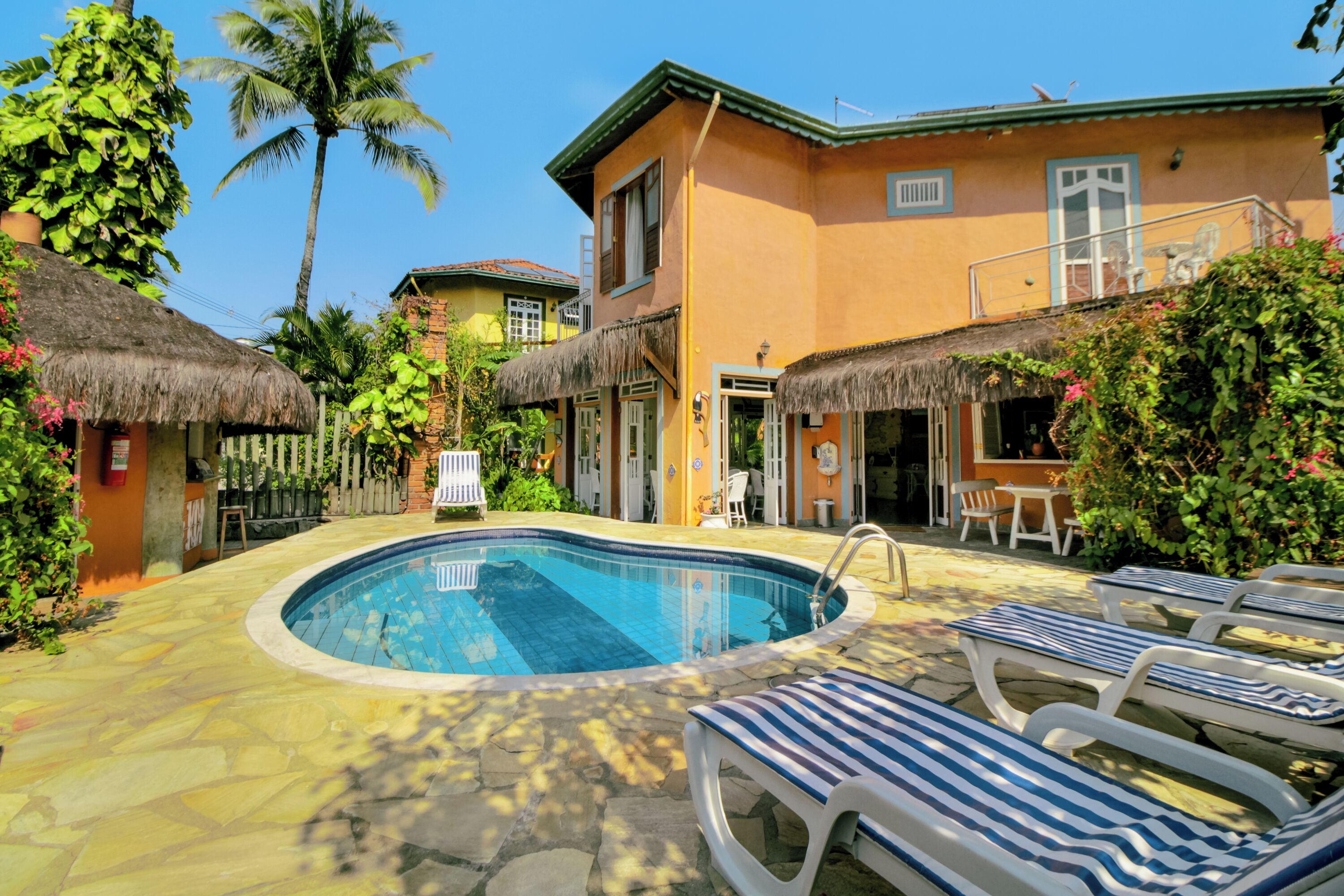 Outdoor pool, open 8:00 AM to 10:00 PM, sun loungers