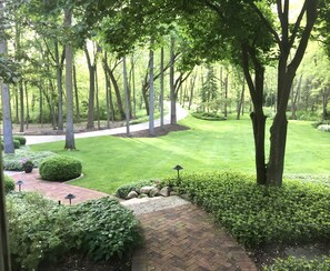 Stroll through the beautifully manicured garden, surrounded by lush greenery and a tranquil atmosphere.