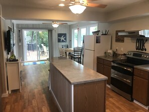 Fridge, microwave, oven, stovetop - Single level home in a gentle, quiet , deep water cove  at Lake of the Ozarks . (Roach)