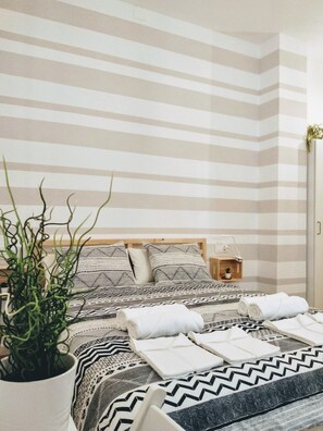 1 habitación, tabla de planchar con plancha, wifi y ropa de cama 
