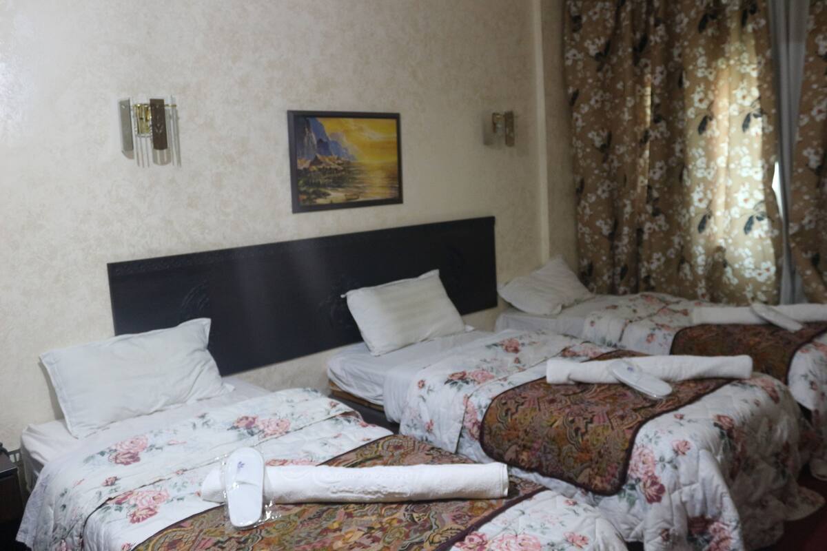 Triple Room | Blackout drapes, free WiFi
