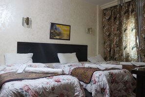 Triple Room | Blackout drapes, free WiFi
