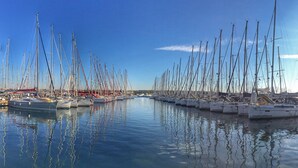 A marina with numerous sailboats docked in calm waters. - Comfortable one bedroom apartment 2+1
max. for 3 persons (Biograd n/m)