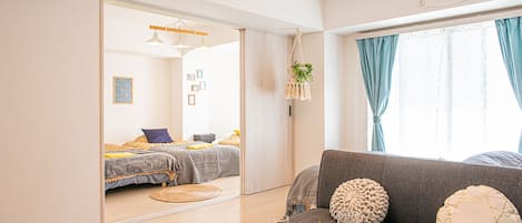 Deluxe Family Room | Living area | Flat-screen TV