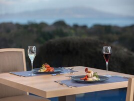 Breakfast, dinner served; French cuisine, ocean views 