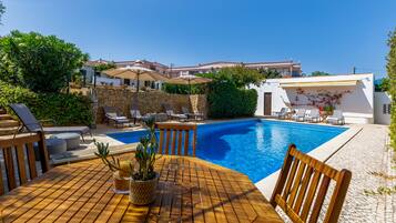 Outdoor pool, sun loungers