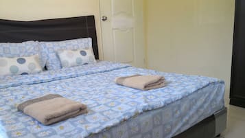 Desk, blackout curtains, iron/ironing board, bed sheets