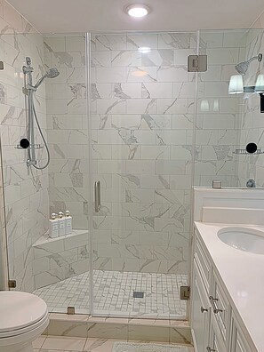 Bathtub, hair dryer, towels, soap