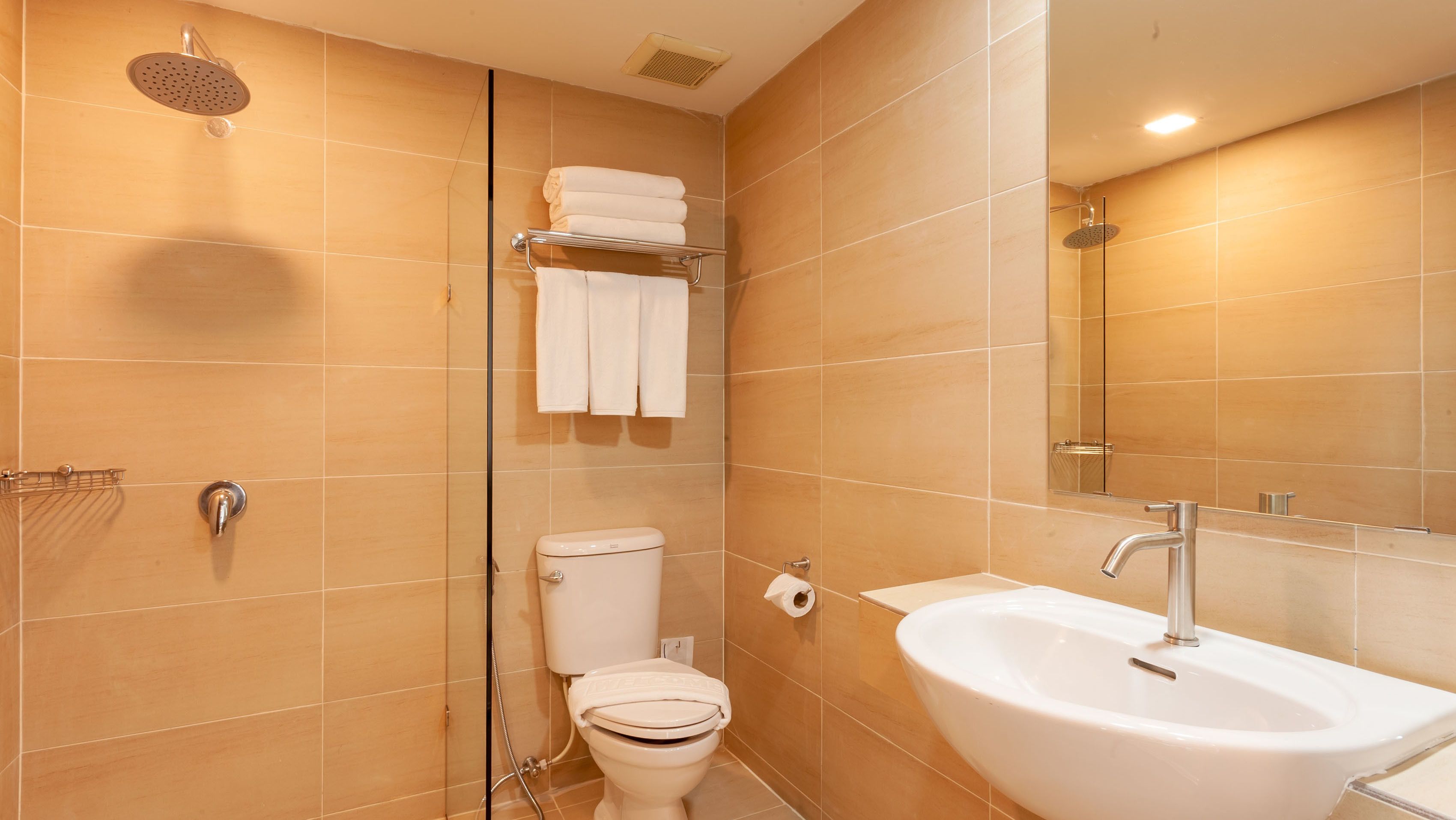 luxury triple room | bathroom | shower, rainfall showerhead, hair dryer, towels