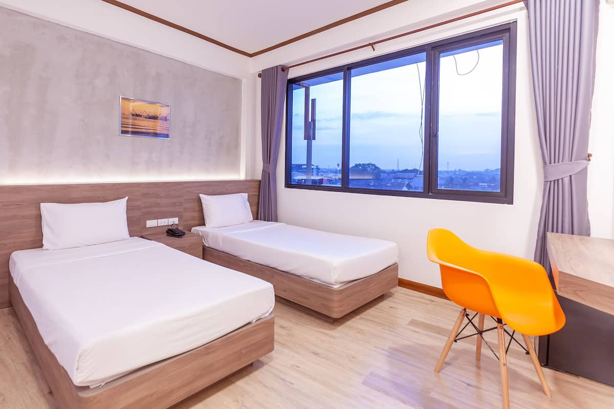 Habitación superior | Cortinas opacas, wifi gratis, ropa de cama