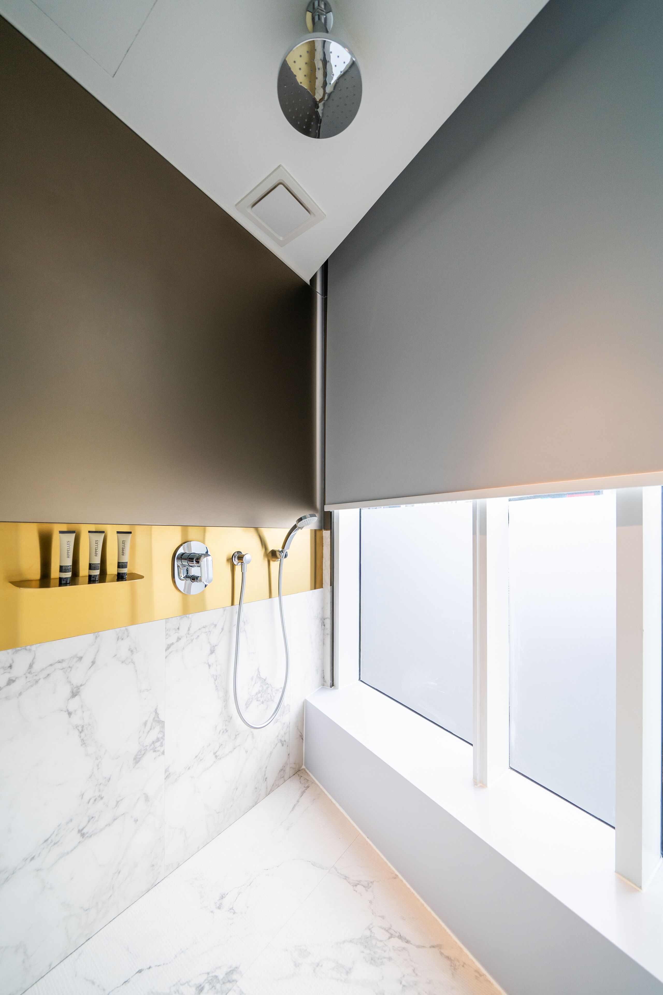 gold king with window | bathroom shower