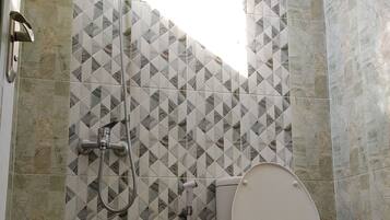 Shower, slippers, towels, shampoo