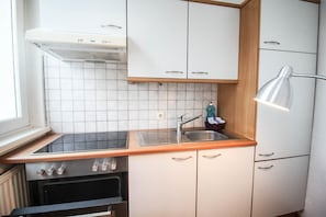 Fridge, oven, coffee/tea maker, toaster