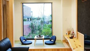 Ocean Aroha Resort A | Living area | Flat-screen TV