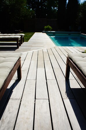 Seasonal outdoor pool, pool loungers