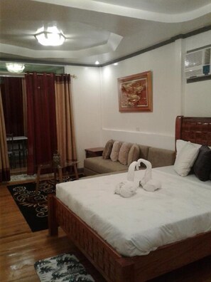 Suíte, 1 cama King | Roupa de cama