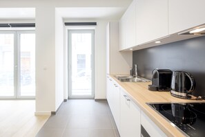 Apartment, 1 Bedroom | Private kitchen | Full-sized fridge, oven, stovetop, espresso maker - Chez Elysée (Brussels)