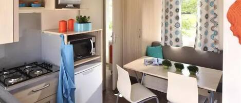 Fridge, microwave, cookware/dishes/utensils