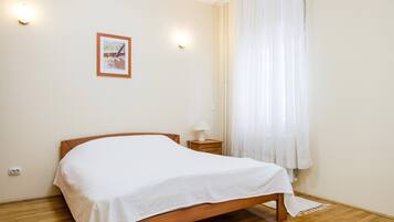 Apartamento conforto, 2 quartos | 2 quartos, roupas de cama antialérgicas, individualmente decorados