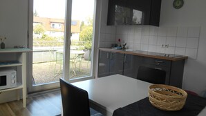 Basic Apartment, 2 Bedrooms, Terrace | Living area | 25-inch LCD TV with cable channels, TV - Blackforest Sport & Bike Appartementhaus (Kirchzarten)