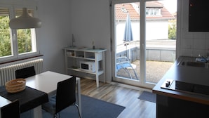 Basic Apartment, 2 Bedrooms, Terrace | Living area | 25-inch LCD TV with cable channels, TV - Blackforest Sport & Bike Appartementhaus (Kirchzarten)