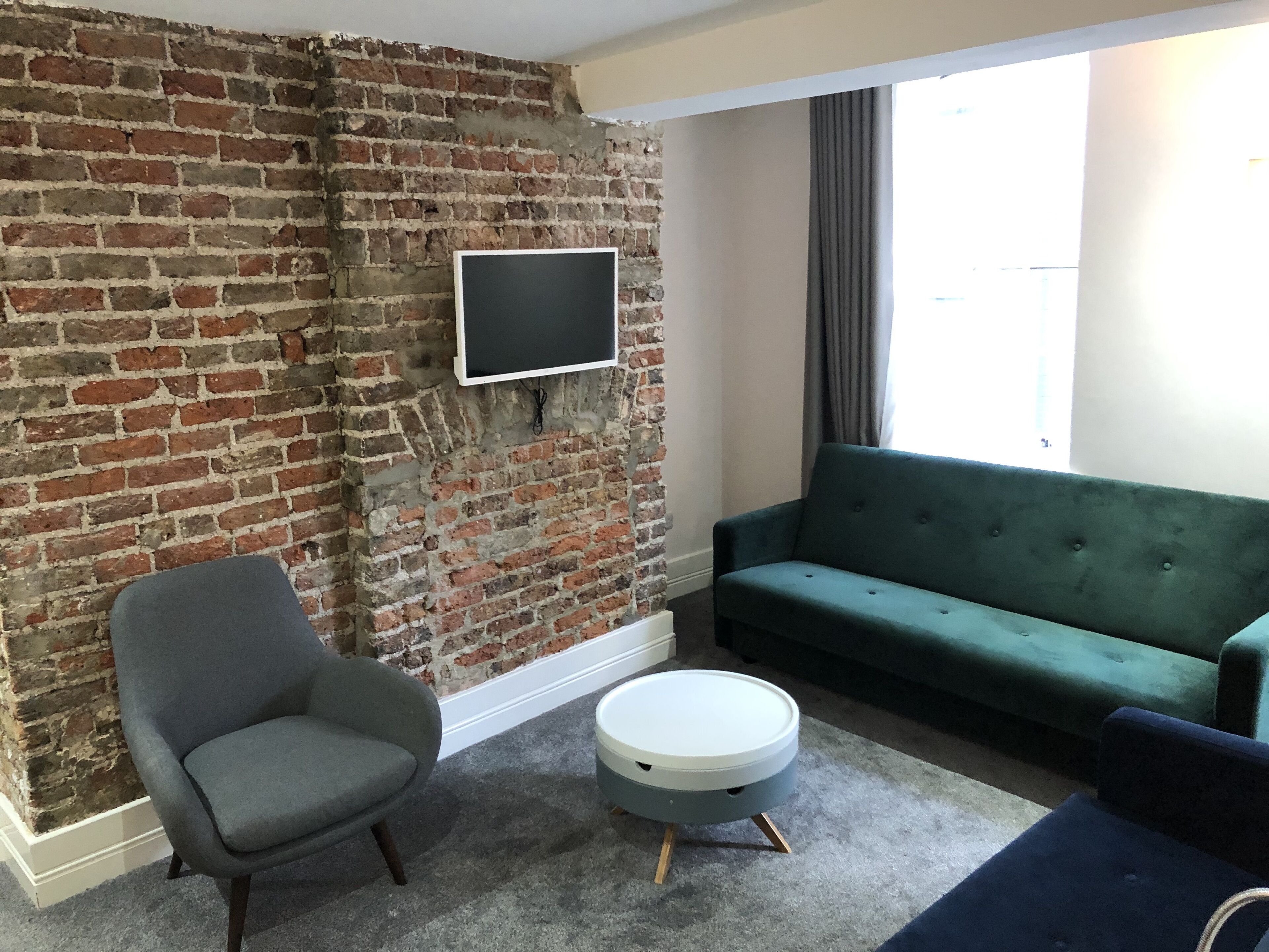 Familie appartement, en-suite badkamer (Street View) | Lounge