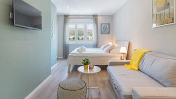 Habitación Deluxe doble, vistas al mar (Extra Bed) | Caja fuerte, sistema de insonorización, wifi gratis y ropa de cama