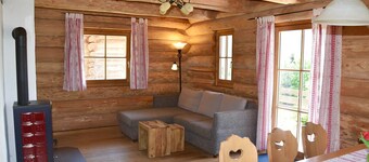 Hôtel & Chalets Herrihof - pour 1-8 personnes, chalets naturels avec vue sur la montagne