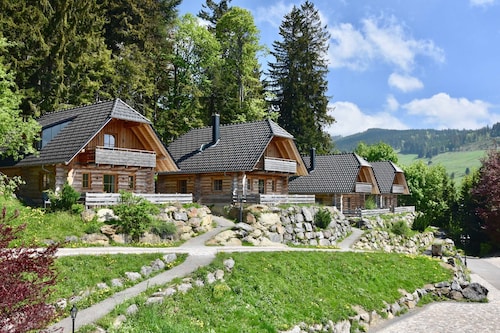 Hôtel & Chalets Herrihof - pour 1-8 personnes, chalets naturels avec vue sur la montagne