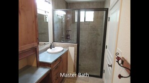 Combined shower/bathtub, hair dryer, towels, soap - Dog-Trot Home on secluded acreage with pool and game room. (Spring Branch)