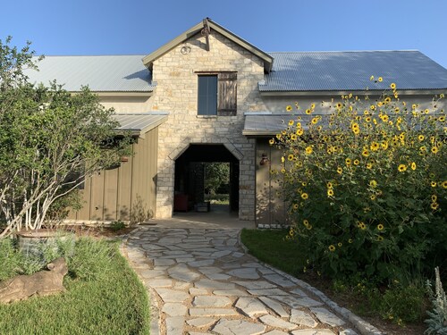 Dog-Trot Home on secluded acreage with pool and game room.