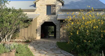 Dog-Trot Home on secluded acreage with pool and game room.