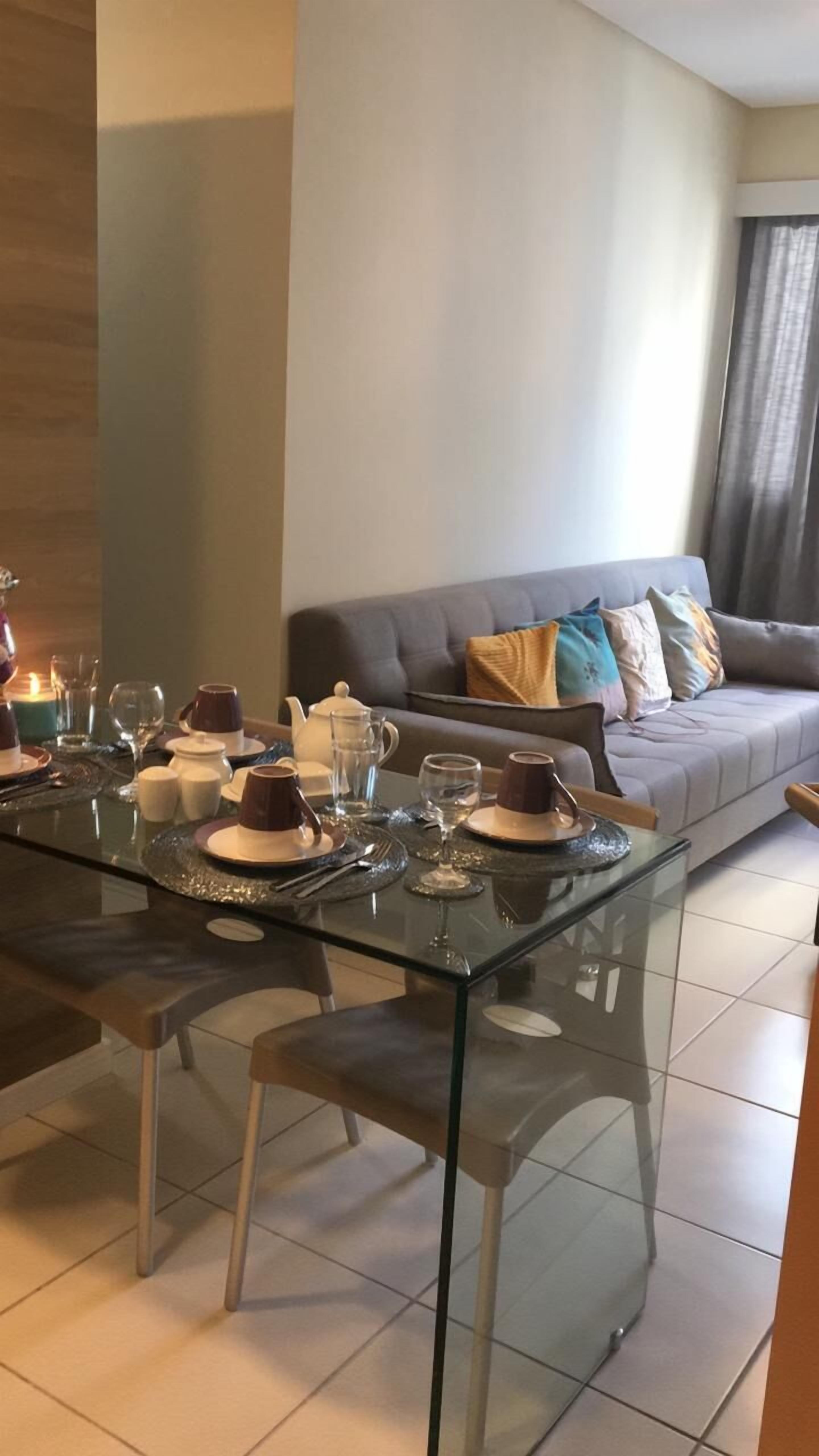 Departamento estándar, para no fumadores | Área de sala de estar | Televisión de pantalla plana 