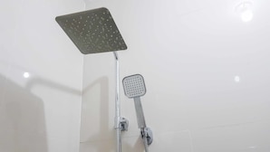 A shower with a square head and a handheld showerhead. - RedDoorz @ VP Inting Street (Tagbilaran)