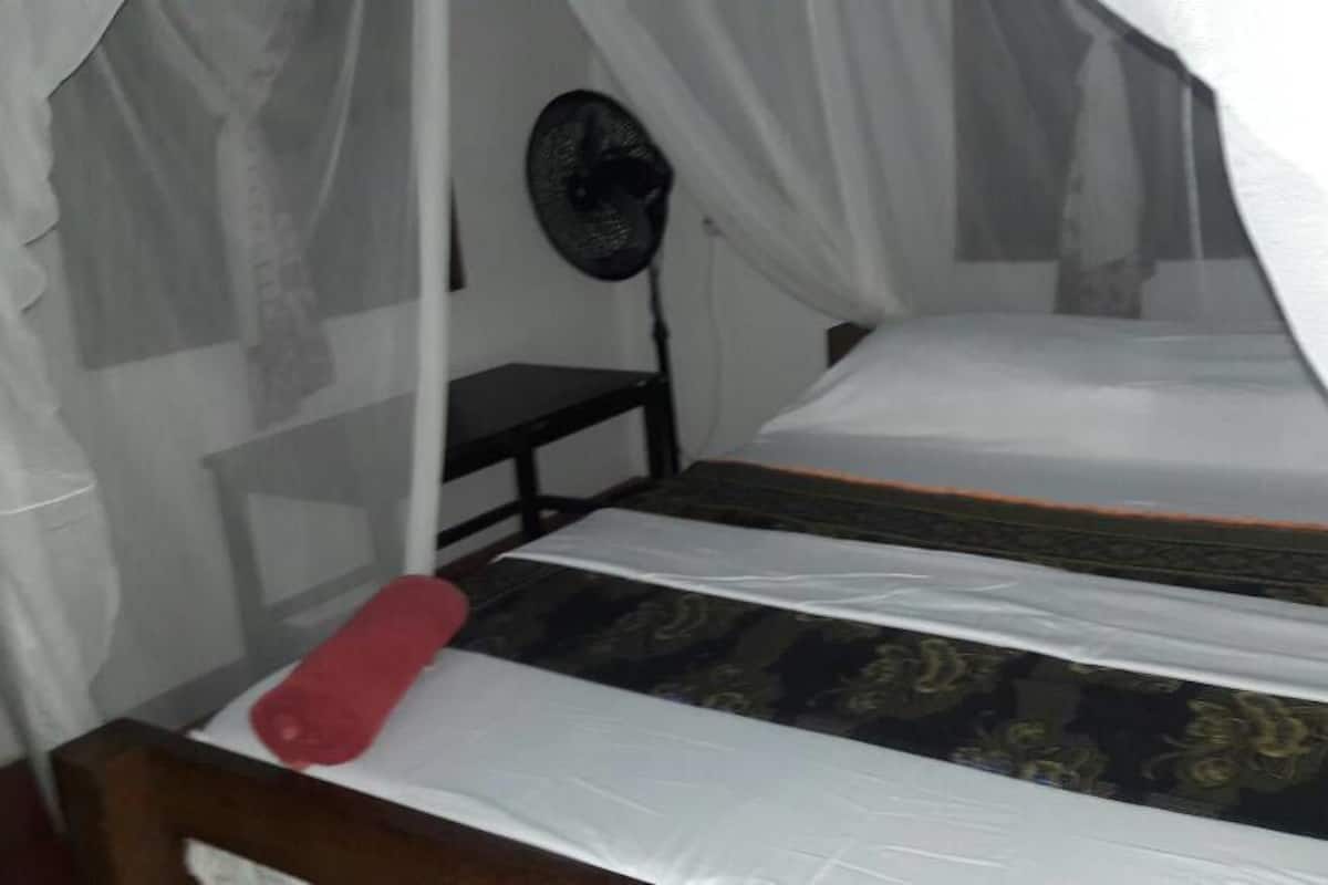 Deluxe Bungalow | 1 bedroom, cribs/infant beds, rollaway beds, bed sheets