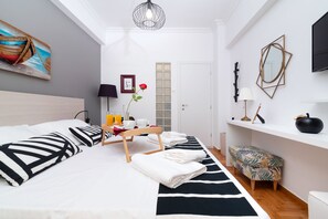 Apartamento urbano | 2 quartos, roupas de cama premium, individualmente decorados