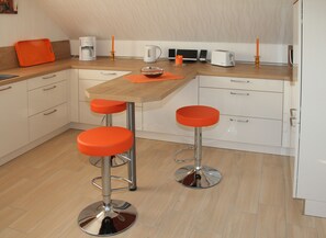Dining - Modern 70 m² vacation apartment with roof terrace Grömitz / Brenkenhagen (Brenkenhagen)